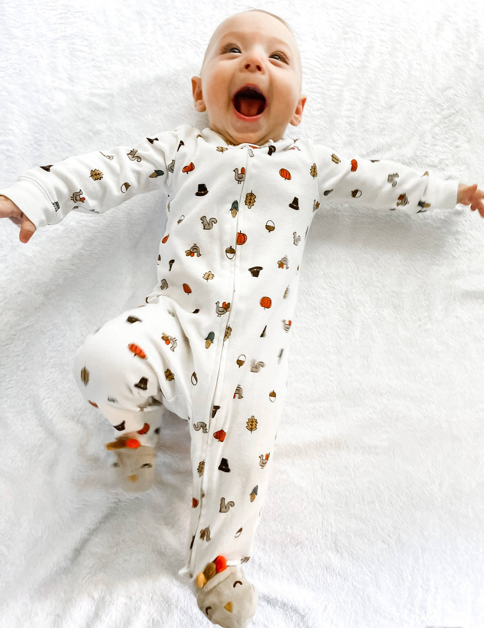 Raegan joined the competition — help win amazing prizes! arm, art, baby_toddler_clothing, carmine, child, eye, fur, gesture, happy, head, human_body, outerwear, pattern, person, sleeve, smile, stuffed_toy, t_shirt, toddler, toy