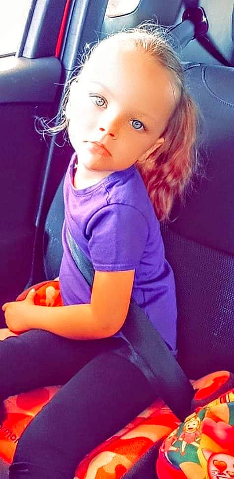 Jaylyn is registered to the contest to win money with this photo: cool, dress, eyebrow, finger, hair, happy, head, human, iris, joint, knee, lip, neck, organ, person, purple, skin, sleeve, sportswear, t_shirt