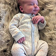 Archie joined the competition — help win amazing prizes! baby, babylaughing, clothing, coat, face, happy, head, jacket, newborn, person, photography, portrait, sitting, sleeve, smile, yawning