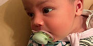 Davina-Leigh is registered to the contest to win money with this photo: baby, infant, pacifier, face, head, clothing, pattern, tiger_print, close_up, cute, child, young, skin, ear, eyes, person, portrait, resting, indoors, soft_lighting