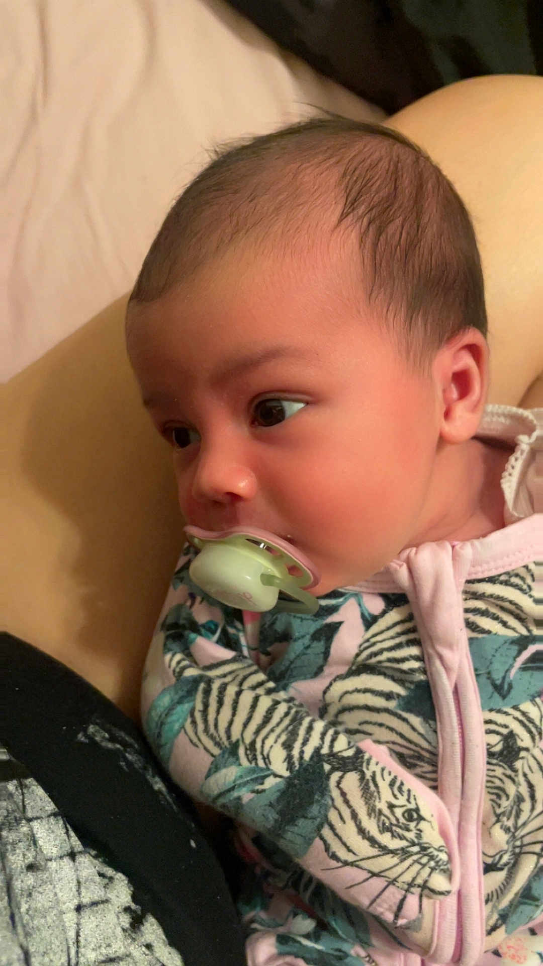 Davina-Leigh is registered to the contest to win money with this photo: baby, infant, pacifier, face, head, clothing, pattern, tiger_print, close_up, cute, child, young, skin, ear, eyes, person, portrait, resting, indoors, soft_lighting