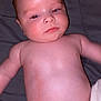 Nino participe au concours pour gagner de l'argent avec cette photo : baby, bare_chest, bed, blanket, child, cute, expression, face, hand, head, human, indoors, infant, lying_down, newborn, resting, sheet, skin, sleepy, soft_light