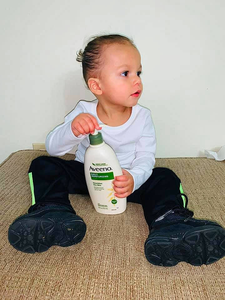 Jayvian joined the competition — help win amazing prizes! baby, bottle, child, floor, flooring, person, plastic_bottle, play, sitting, toddler