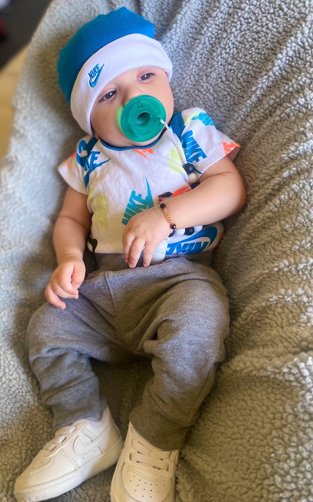 Marc joined the competition — help win amazing prizes! arm, baby, baby_toddler_clothing, cap, comfort, elbow, finger, hand, hat, human_body, joint, knee, leg, outerwear, person, skin, sleeve, sock, textile, thigh