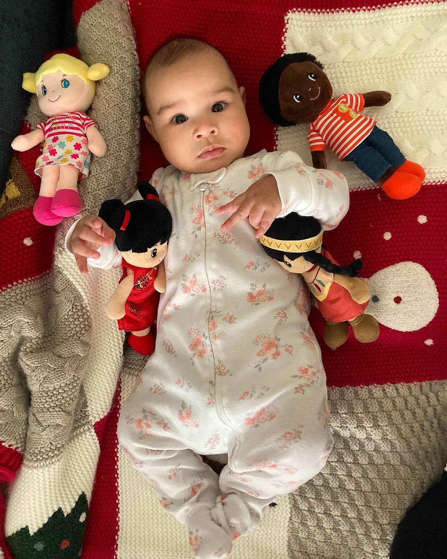 Leila is registered to the contest to win money with this photo: baby, baby_toddler_clothing, baby_toys, cheek, child, doll, hand, head, pattern, person, pink, plush, red, room, skin, sleeve, stuffed_toy, textile, toddler, toy