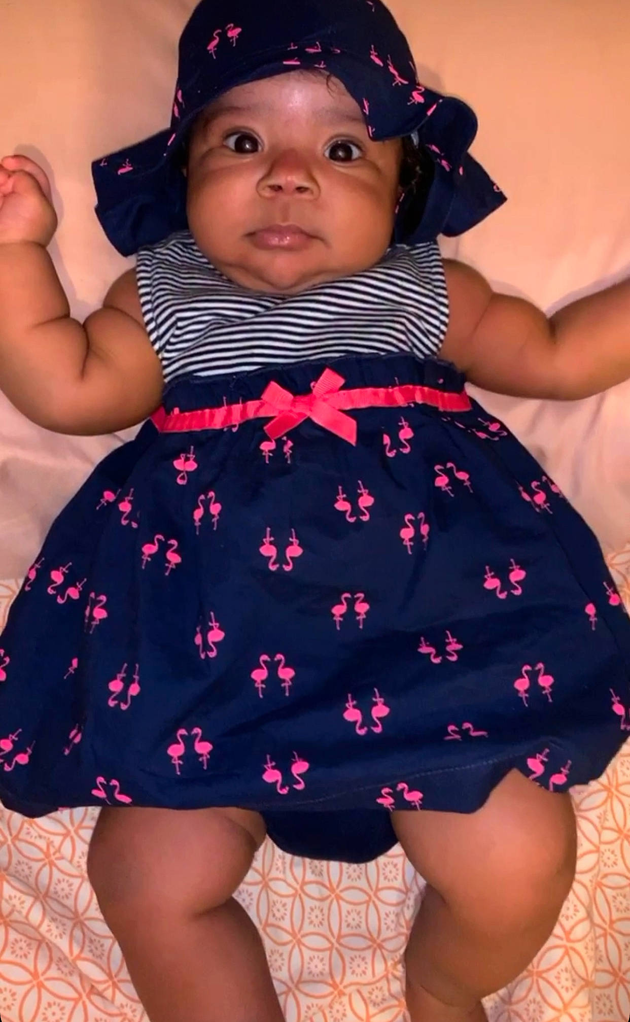 Moriyah joined the competition — help win amazing prizes! abdomen, black_hair, cheek, child, child_model, clothing, headwear, leg, pattern, person, pink, thigh, toddler, trunk