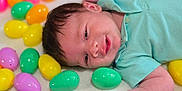 Waylon joined the competition — help win amazing prizes! baby, balloon, bodypart, candy, face, finger, food, hand, head, newborn, person, photography, portrait, purple, sphere, sweets, toe, toy