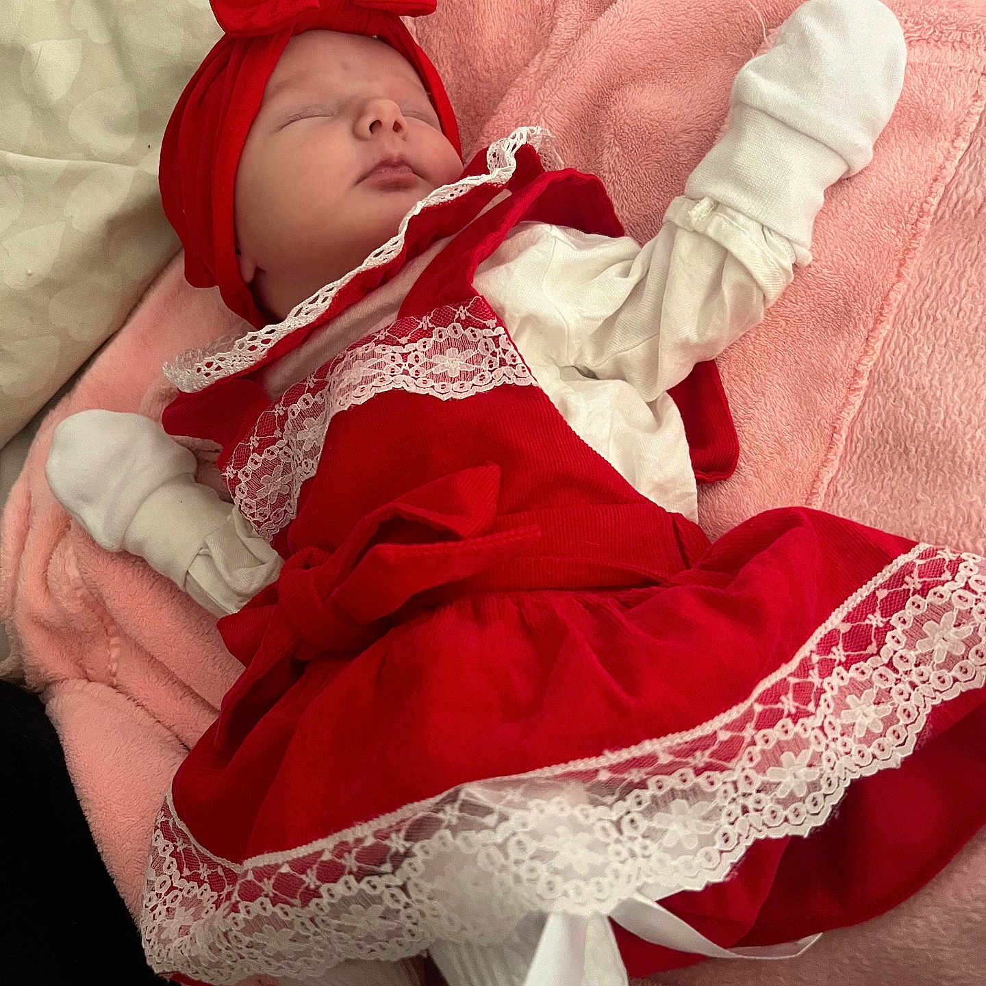 Tilly-Rae joined the competition — help win amazing prizes! adorable, baby, blanket, child, cozy, cute, footwear, headband, indoors, infant, newborn, peaceful, pink_blanket, portrait, red_dress, resting, sleeping, soft_texture, white_clothing, white_lace