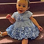 Raylynn joined the competition — help win amazing prizes! baby, child, girl, dress, blue_dress, stairs, carpet, smiling, happy, sitting, footwear, sandals, hair_bun, cute, indoors, portrait, young_child, fashion, childrens_clothing, person