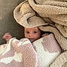 Josephine joined the competition — help win amazing prizes! baby, blanket, fleece, cozy, couch, child, face, wrapped, soft, indoors, comfort, curious, peeking, pink, white, beige, warm, portrait, infant, snug