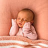 Josephine is registered to the contest to win money with this photo: baby, sleeping, infant, pink, blanket, cozy, soft_texture, peaceful, cute, newborn, portrait, child, resting, warm, fabric, comfort, face, hands, bed, nap