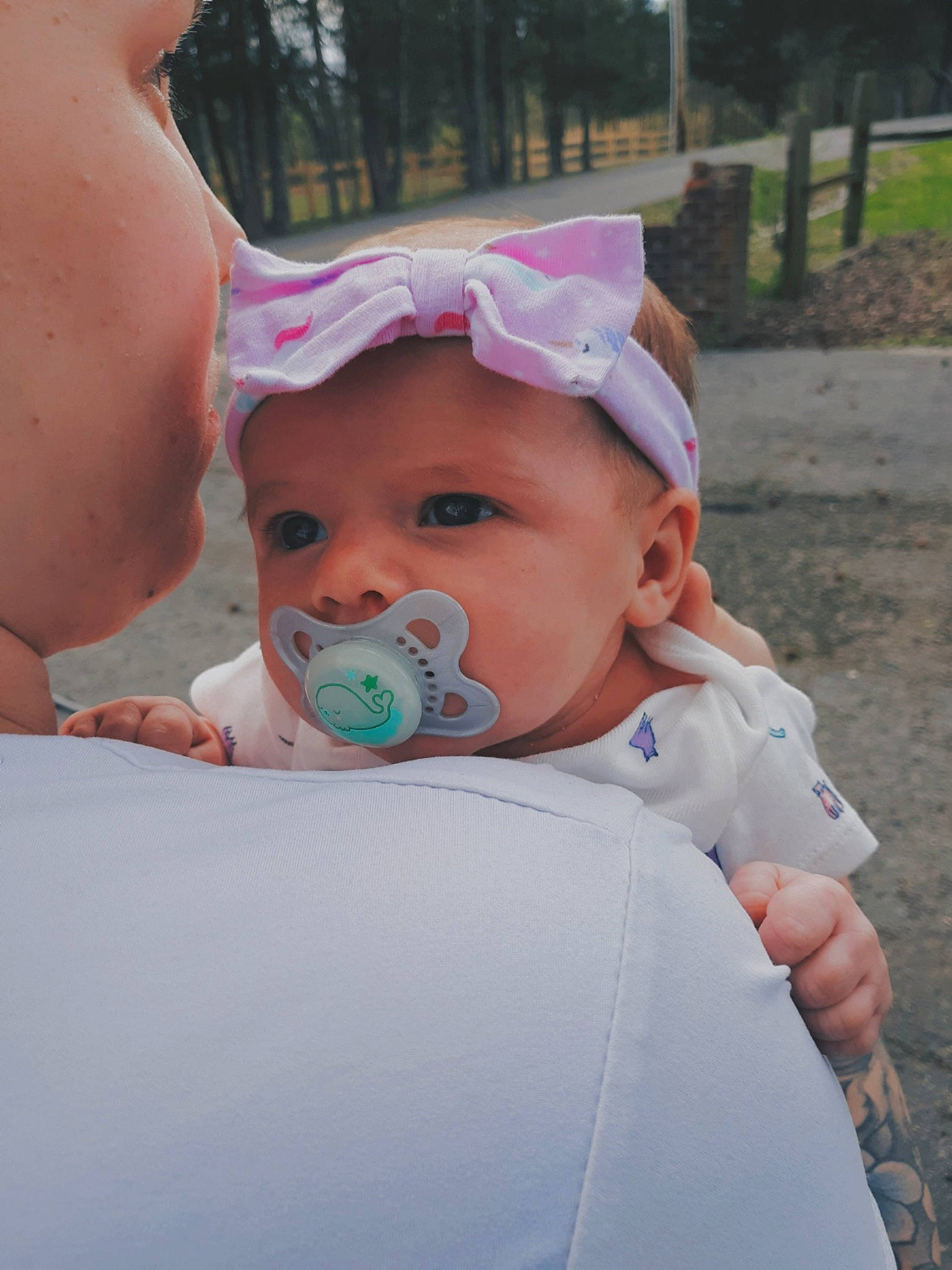 Khloe is registered to the contest to win money with this photo: baby, baby_products, child, headwear, people, person, pink, skin, smile, toddler, vacation