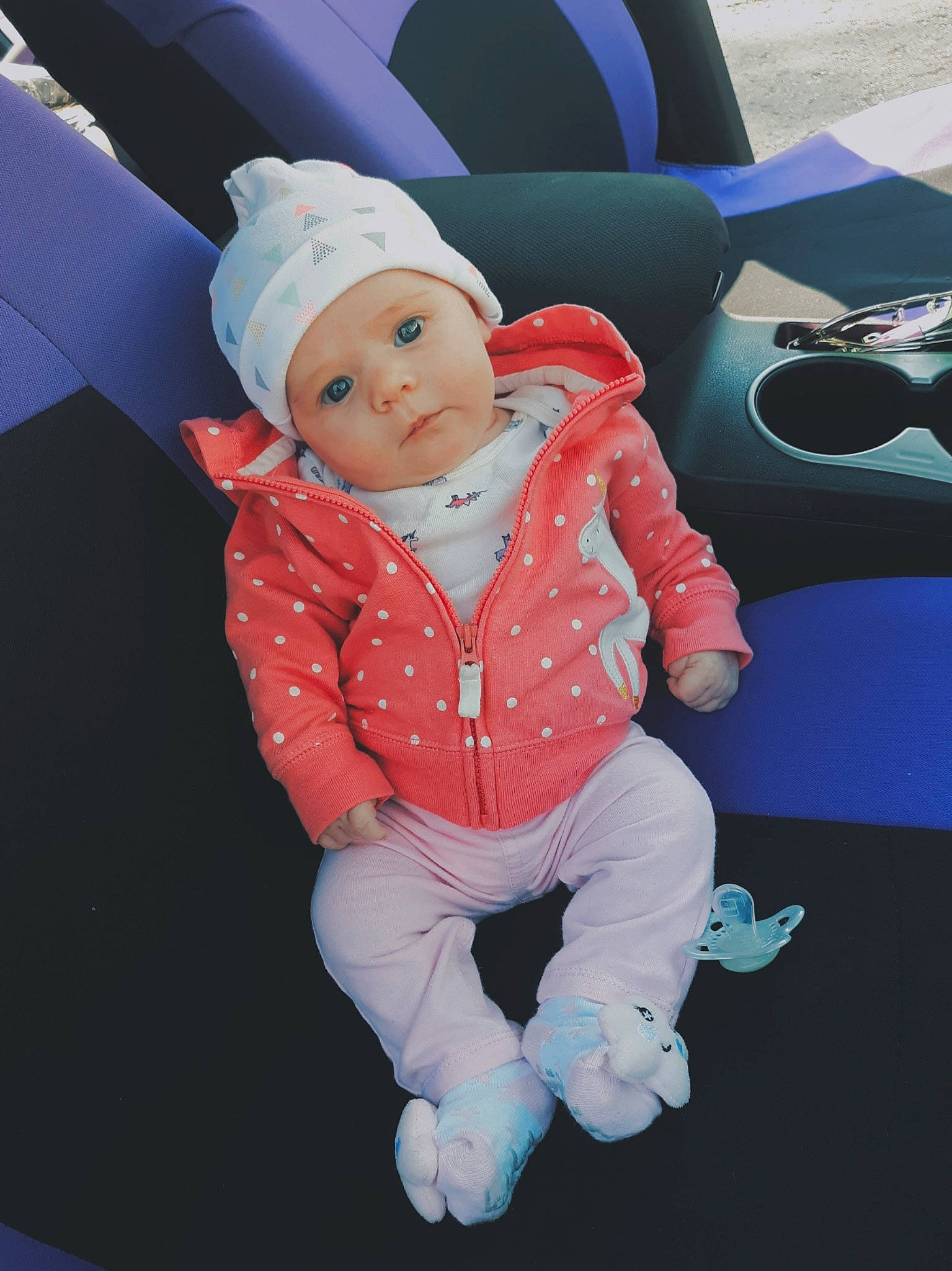 Khloe is registered to the contest to win money with this photo: baby, cheek, child, headwear, person, pink, space, toddler, vacation