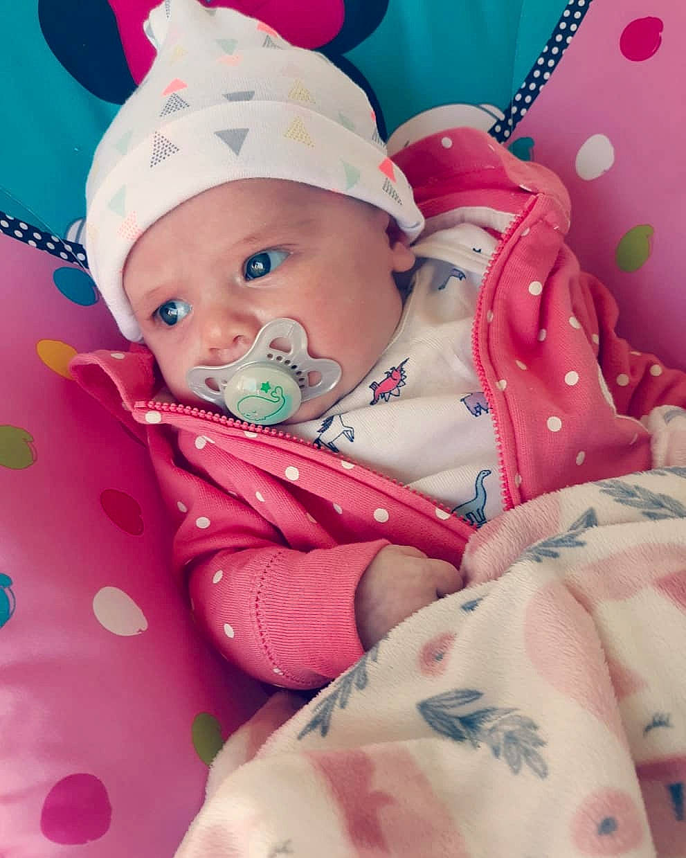 Khloe joined the competition — help win amazing prizes! baby, birth, cheek, child, happy, headwear, linens, lip, nose, person, pink, skin, textile, toddler, toy