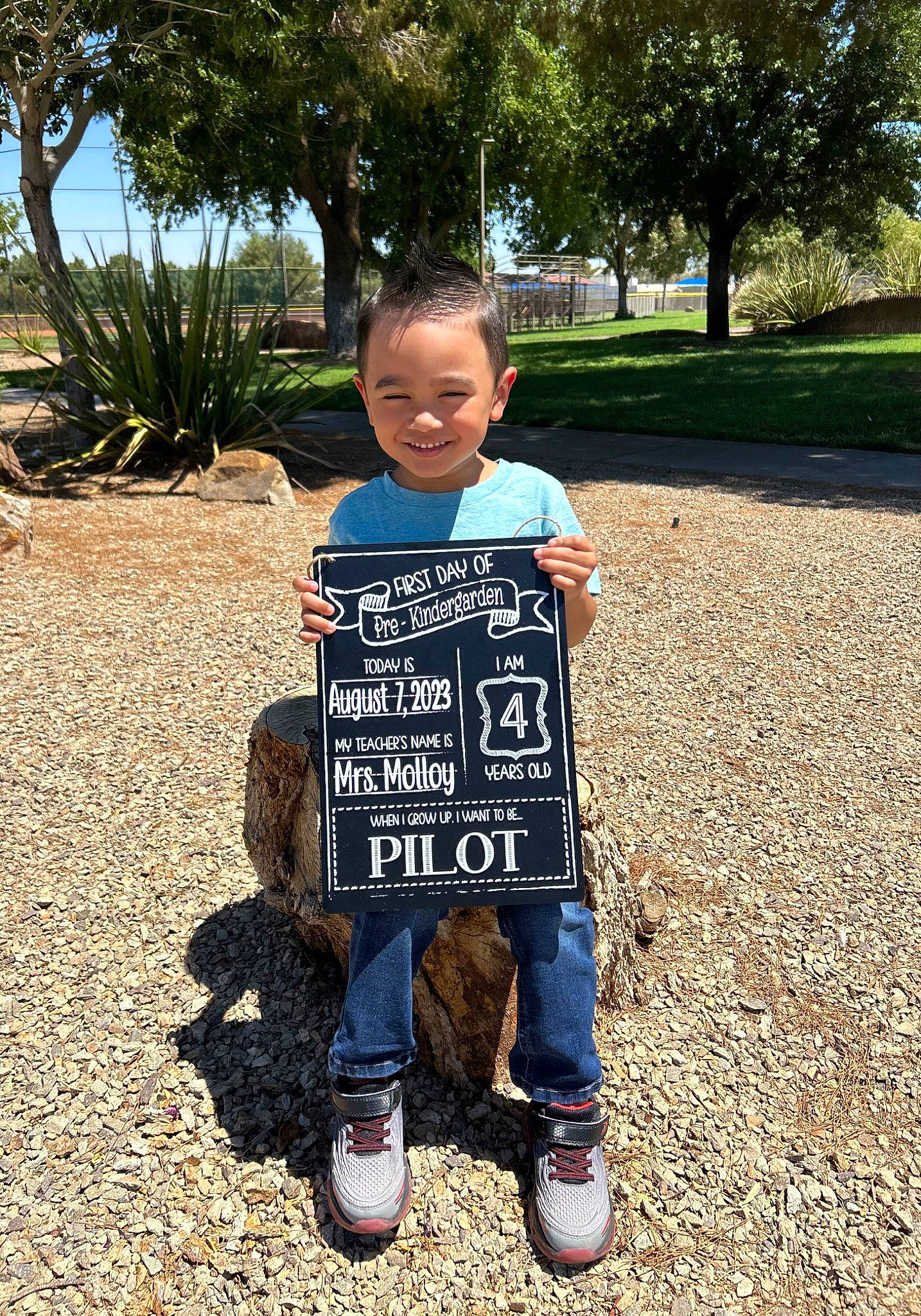 Cristian is registered to the contest to win money with this photo: asphalt, denim, fun, grass, grass_family, handwriting, happy, joy, landscape, leaf, leisure, people_in_nature, person, plant, recreation, shoe, sleeve, smile, soil, t_shirt