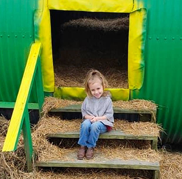 Autumn Skye joined the competition — help win amazing prizes! fun, grass, green, joy, leaf, leisure, mammal, outdoor_play_equipment, outerwear, people_in_nature, person, plant, playground, public_space, smile, standing, t_shirt, toddler, tree, wood