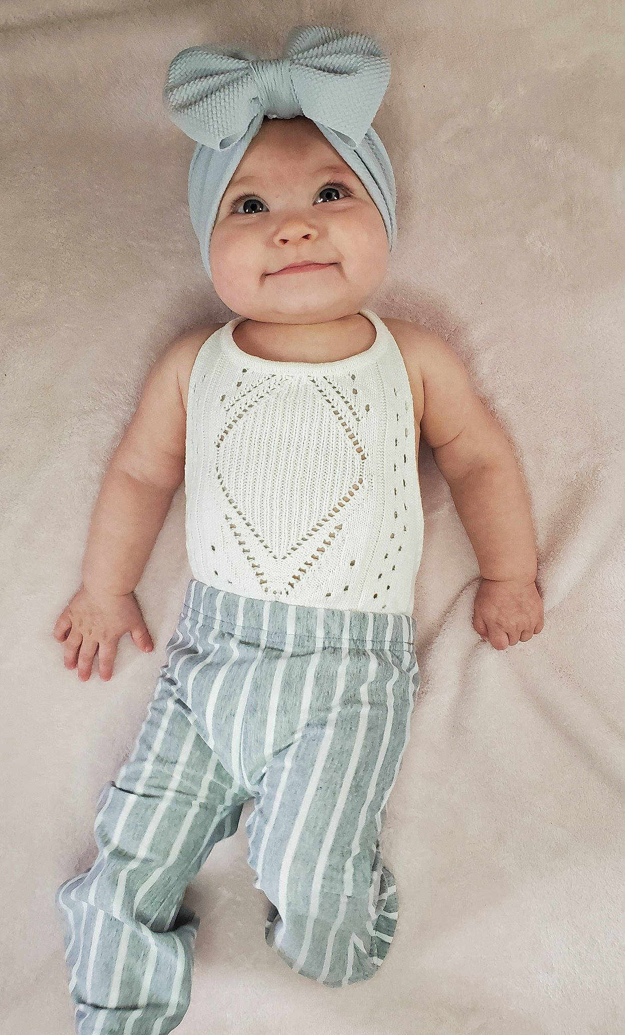 Anastazia is registered to the contest to win money with this photo: baby, baby_products, baby_toddler_clothing, child, clothing, headgear, headwear, infant_bodysuit, joy, knitting, pattern, person, product, sleeve, toddler, white