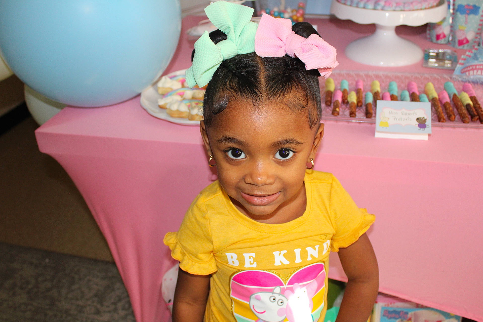 Kahlani is registered to the contest to win money with this photo: adaptation, balloon, birthday, cheek, child, ear, event, fun, happy, head, joy, leisure, magenta, party, party_supply, person, pink, room, smile, t_shirt