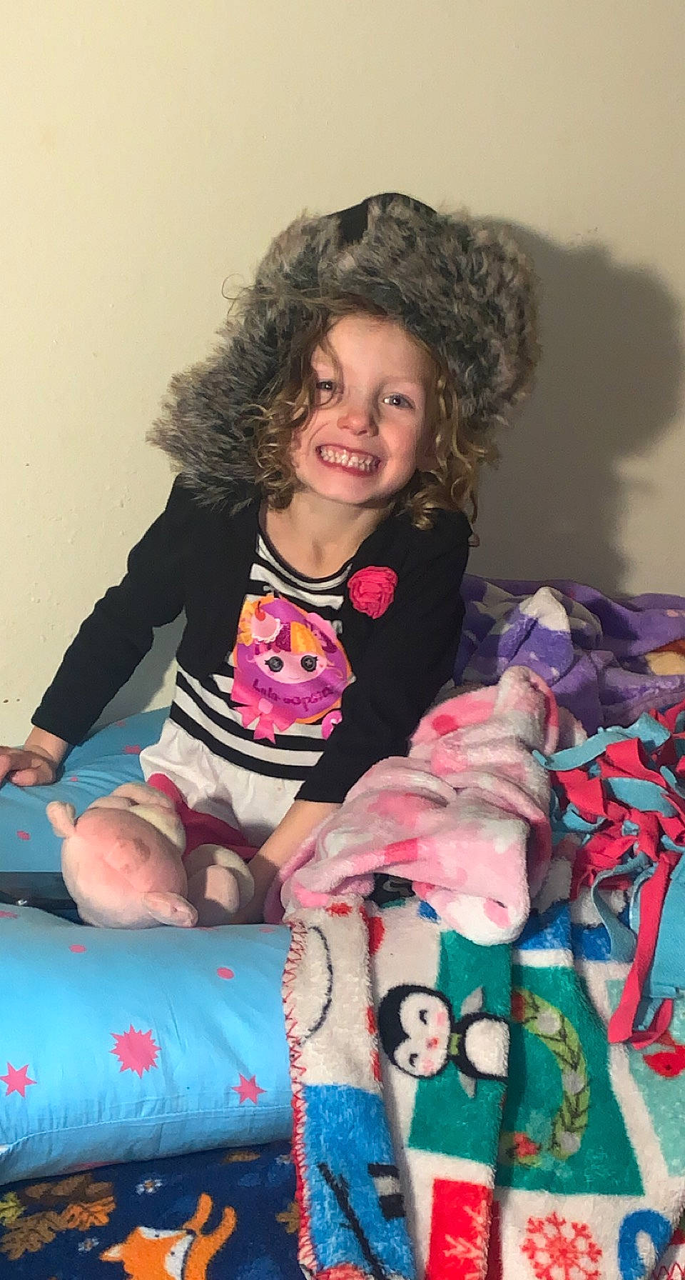 Aly joined the competition — help win amazing prizes! baby_toddler_clothing, beauty, cheek, child, eye, facial_expression, fashion_design, fun, happy, joy, lap, magenta, person, pink, ringlet, sitting, skin, sleeve, smile, sock
