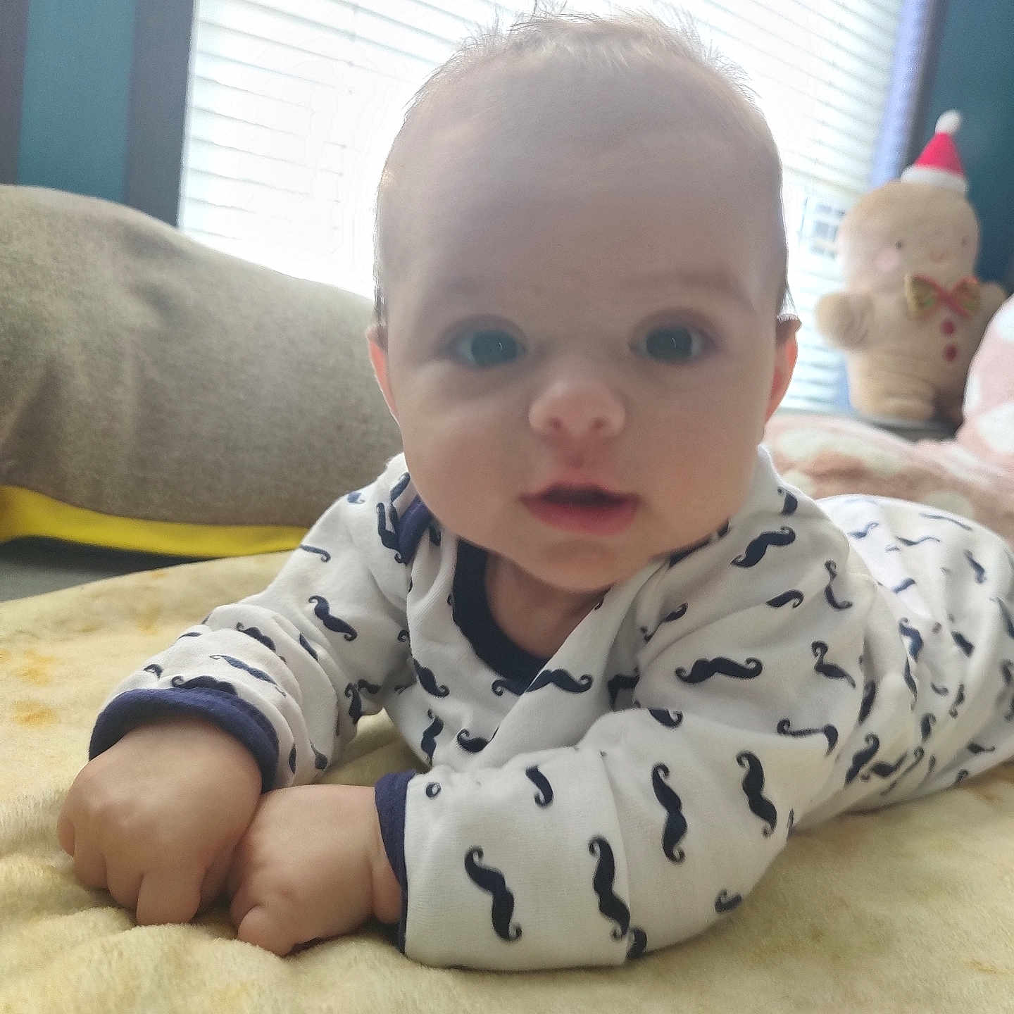 Nathan joined the competition — help win amazing prizes! baby, bodypart, clothing, couch, crawling, cushion, face, finger, furniture, hand, head, homedecor, indoors, newborn, pajamas, person, photography, portrait, sitting, toy