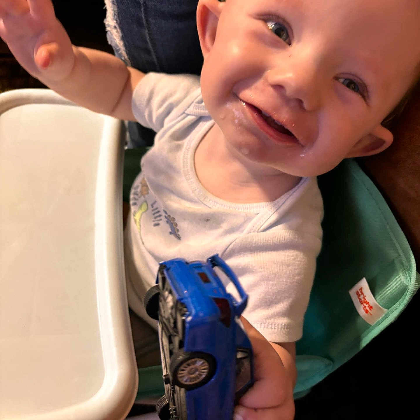 Mason joined the competition — help win amazing prizes! baby, bodypart, chair, clothing, cream, cutlery, face, finger, furniture, gun, hand, happy, head, person, photography, portrait, smile, spoon, t_shirt, weapon