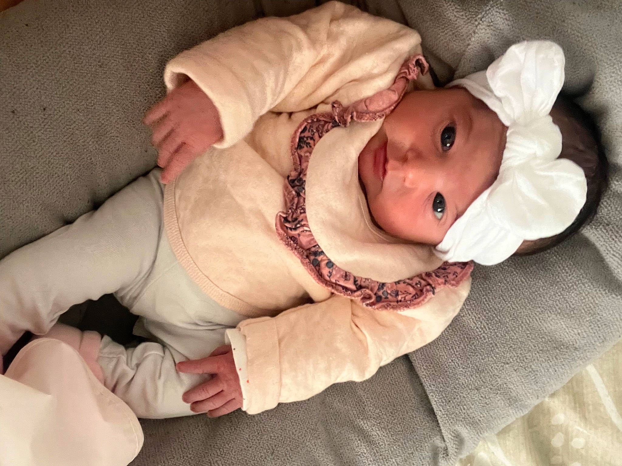 Lou participe au concours pour gagner de l'argent avec cette photo : baby, baby_toddler_clothing, cheek, child, comfort, eye, face, hat, head, headgear, headwear, human_body, iris, linens, lip, mouth, pattern, person, skin, sleeve