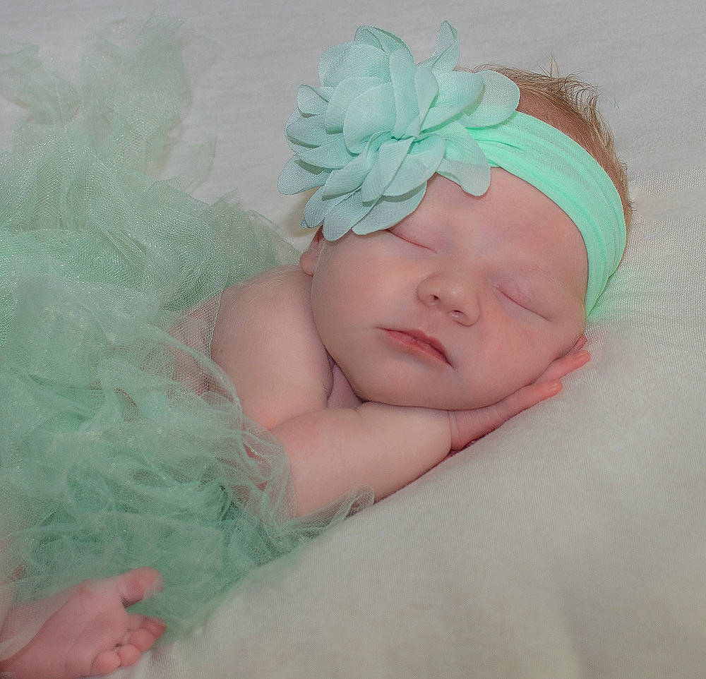 Bria joined the competition — help win amazing prizes! aqua, baby, baby_products, baby_sleeping, baby_toddler_clothing, child, costume_accessory, fashion_accessory, hair_accessory, head, headband, headgear, headpiece, person, product, toddler, turquoise