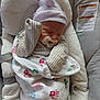 Caolan is registered to the contest to win money with this photo: newborn, baby, sleeping, pacifier, blanket, mittens, hat, bouncer, cushion, infant, indoor, resting, cozy, patterned, child, cute, soft, wrapped, peaceful, young