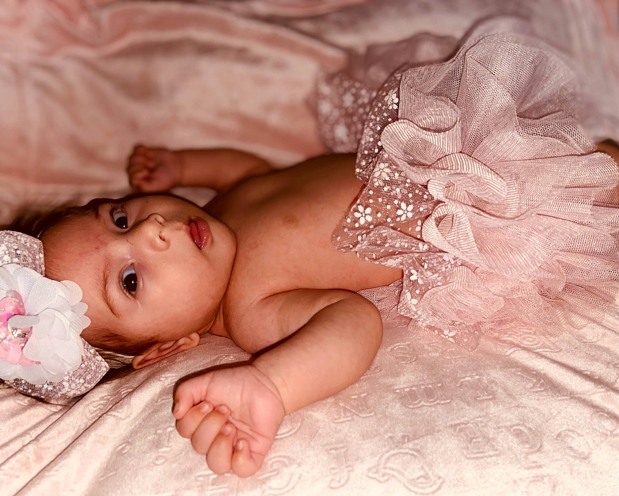 Renesmae joined the competition — help win amazing prizes! baby, baby_sleeping, baby_toddler_clothing, chest, child, comfort, embellishment, face, fashion_accessory, finger, flash_photography, happy, headgear, headpiece, headwear, human_leg, linens, lip, person, pink