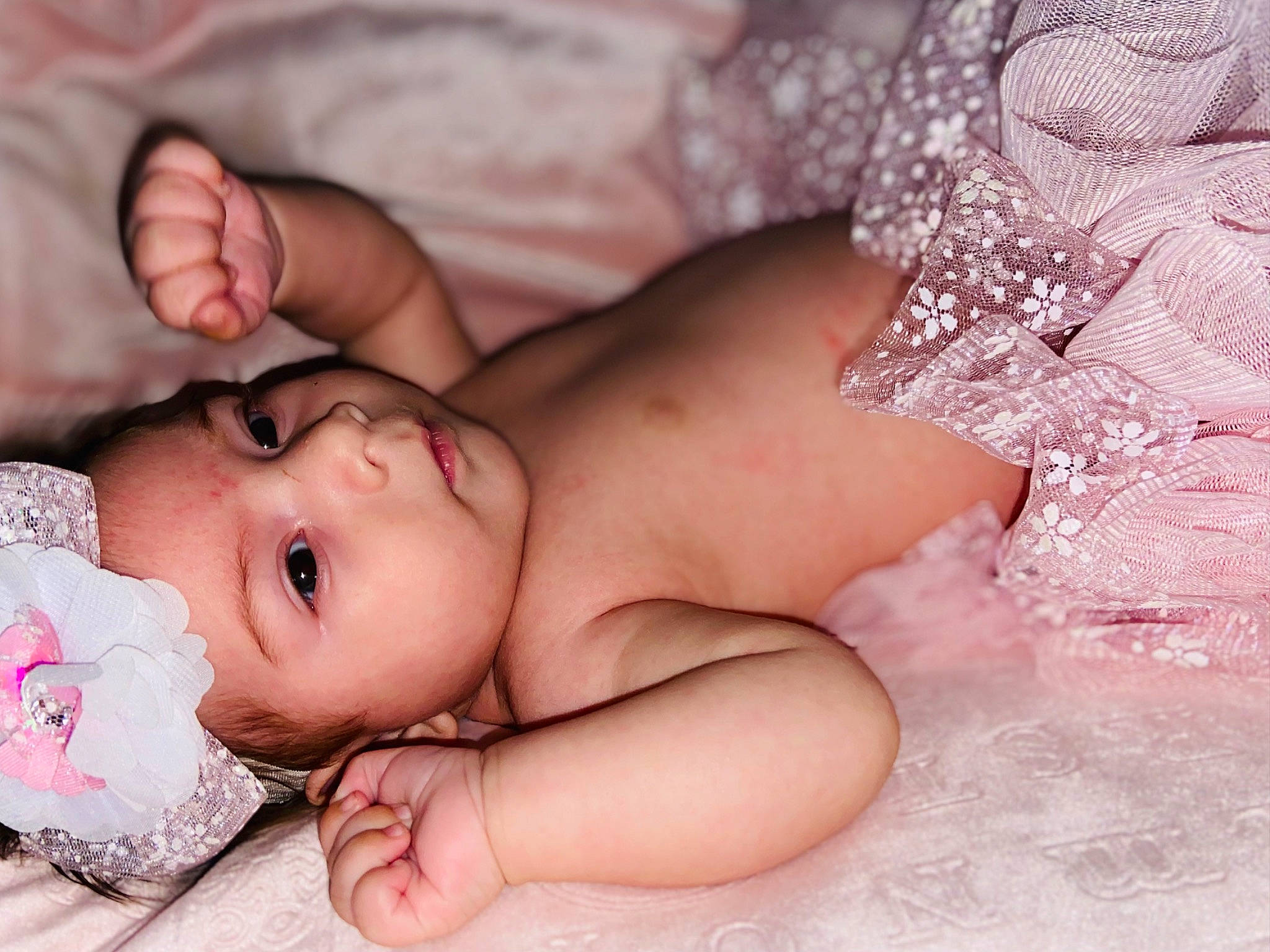 Renesmae joined the competition — help win amazing prizes! baby, baby_toddler_clothing, cheek, chest, child, comfort, eyebrow, facial_expression, flash_photography, grass, happy, headgear, headwear, human_body, lip, mouth, muscle, person, photograph, pink