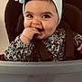 Nour participe au concours pour gagner de l'argent avec cette photo : baby, bright_eyes, cheerful, child, clothing, cute, expression, face, floral_pattern, hand, happy, headwrap, high_chair, indoors, infant, person, portrait, seatbelt, smiling, toddler