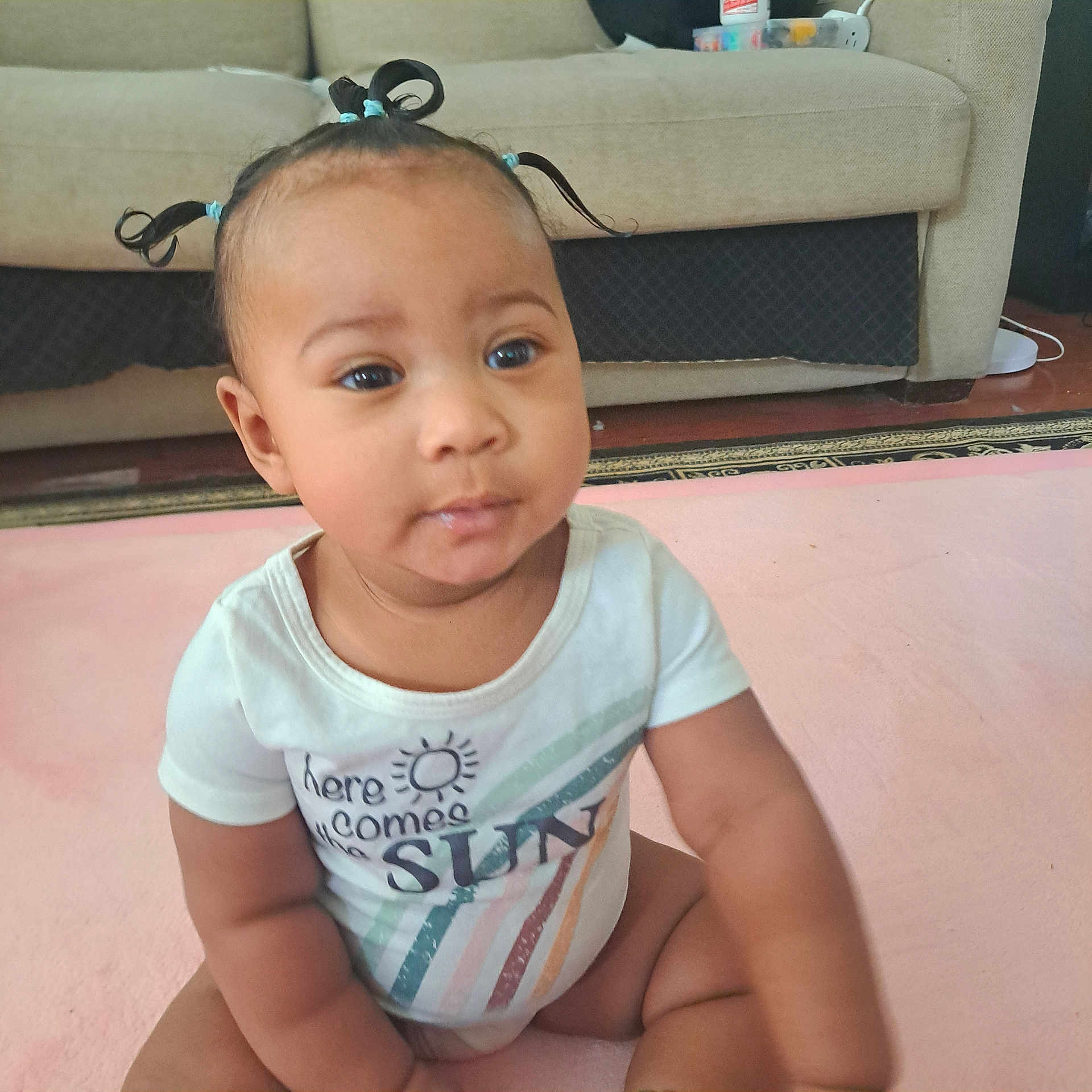 Natsumi joined the competition — help win amazing prizes! architecture, baby, building, clothing, couch, crawling, cushion, face, furniture, head, homedecor, indoors, livingroom, person, photography, portrait, room, sitting, t_shirt, wood