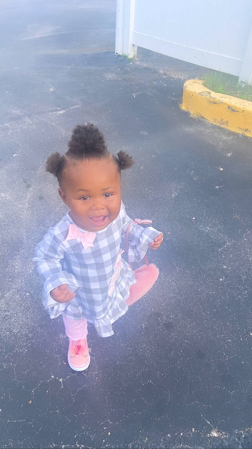 Amoura joined the competition — help win amazing prizes! asphalt, baby, child, flooring, fun, grass, happy, landscape, leisure, meteorological_phenomenon, ocean, pattern, people_in_nature, person, play, road_surface, shadow, sky, toddler, wind_wave