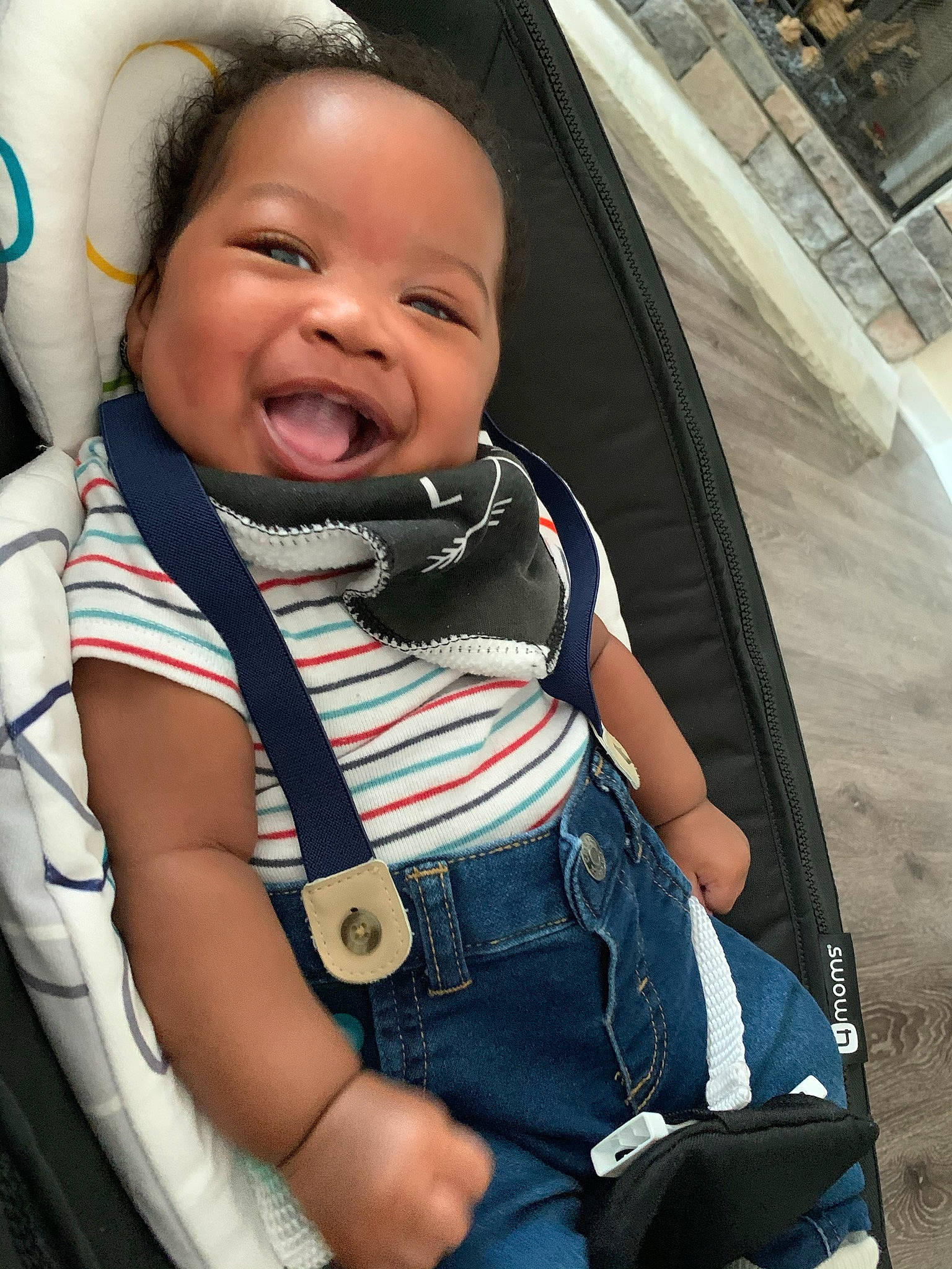 Marcel is registered to the contest to win money with this photo: auto_part, baby, baby_carriage, baby_products, baby_safety, baby_toddler_clothing, car_seat, cheek, child, comfort, fashion_accessory, fun, happy, iris, person, service, sitting, skin, smile, toddler