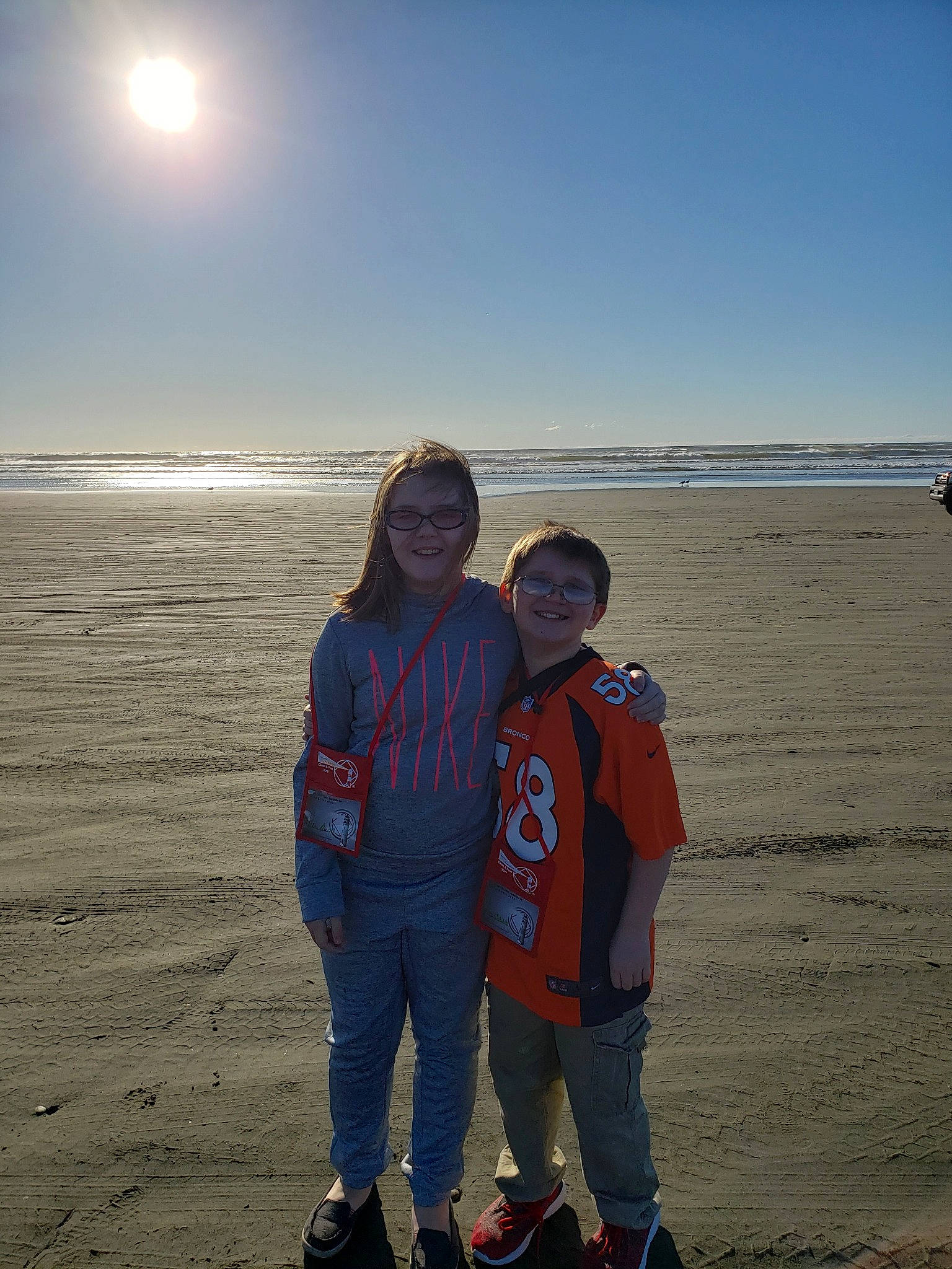 Lilia joined the competition — help win amazing prizes! beach, cloud, coast, fun, gesture, horizon, joy, landscape, natural_environment, ocean, person, photography, sand, sea, shore, sky, sunlight, tourism, travel, vacation