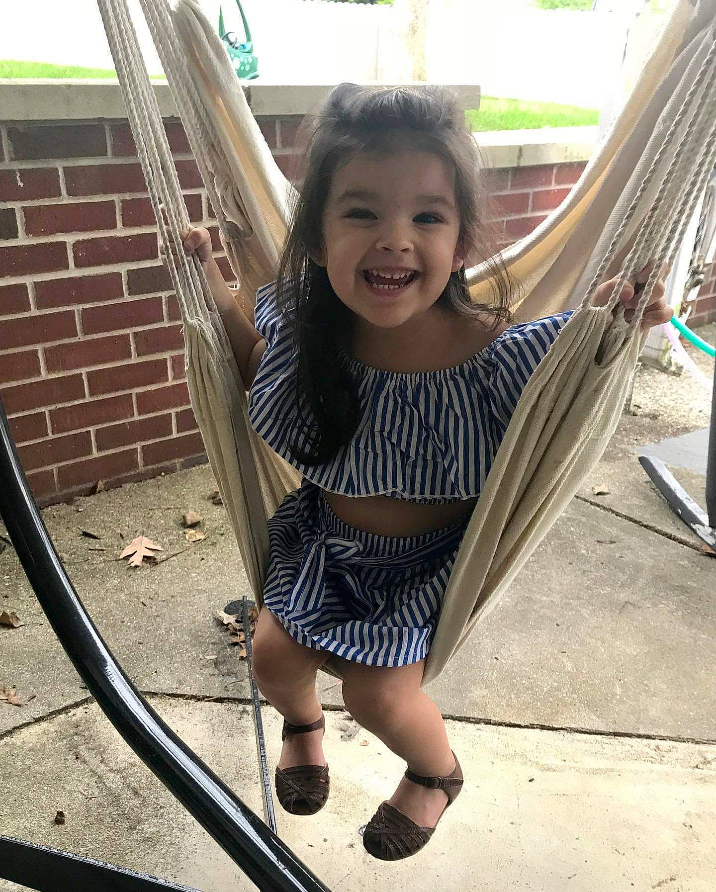 Caralena joined the competition — help win amazing prizes! child, cool, eye, face, facial_expression, fun, hammock, happy, joy, leg, leisure, long_hair, people, person, photography, plant, play, skin, smile, toddler