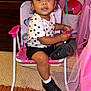toddler, child, polka_dot, shirt, black_shorts, black_shoes, white_socks, chair, pink_chair, carpet, curly_hair, indoor, toy, dresser, person, cute, curious, room, furniture, playful