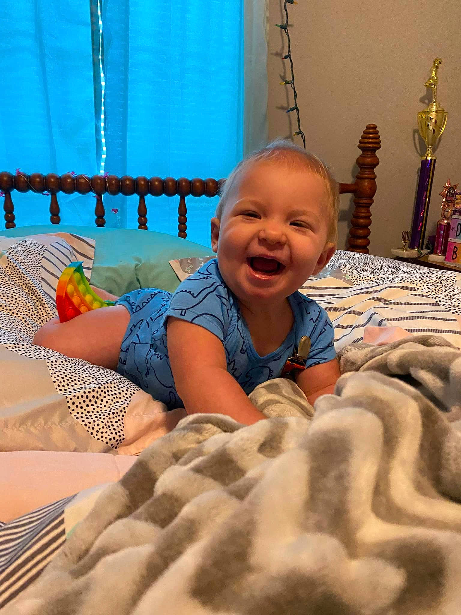 Cayson joined the competition — help win amazing prizes! baby, baby_toddler_clothing, blue, child, comfort, flooring, fun, happy, leisure, linens, pattern, person, play, room, sand, sitting, skin, smile, textile, toddler