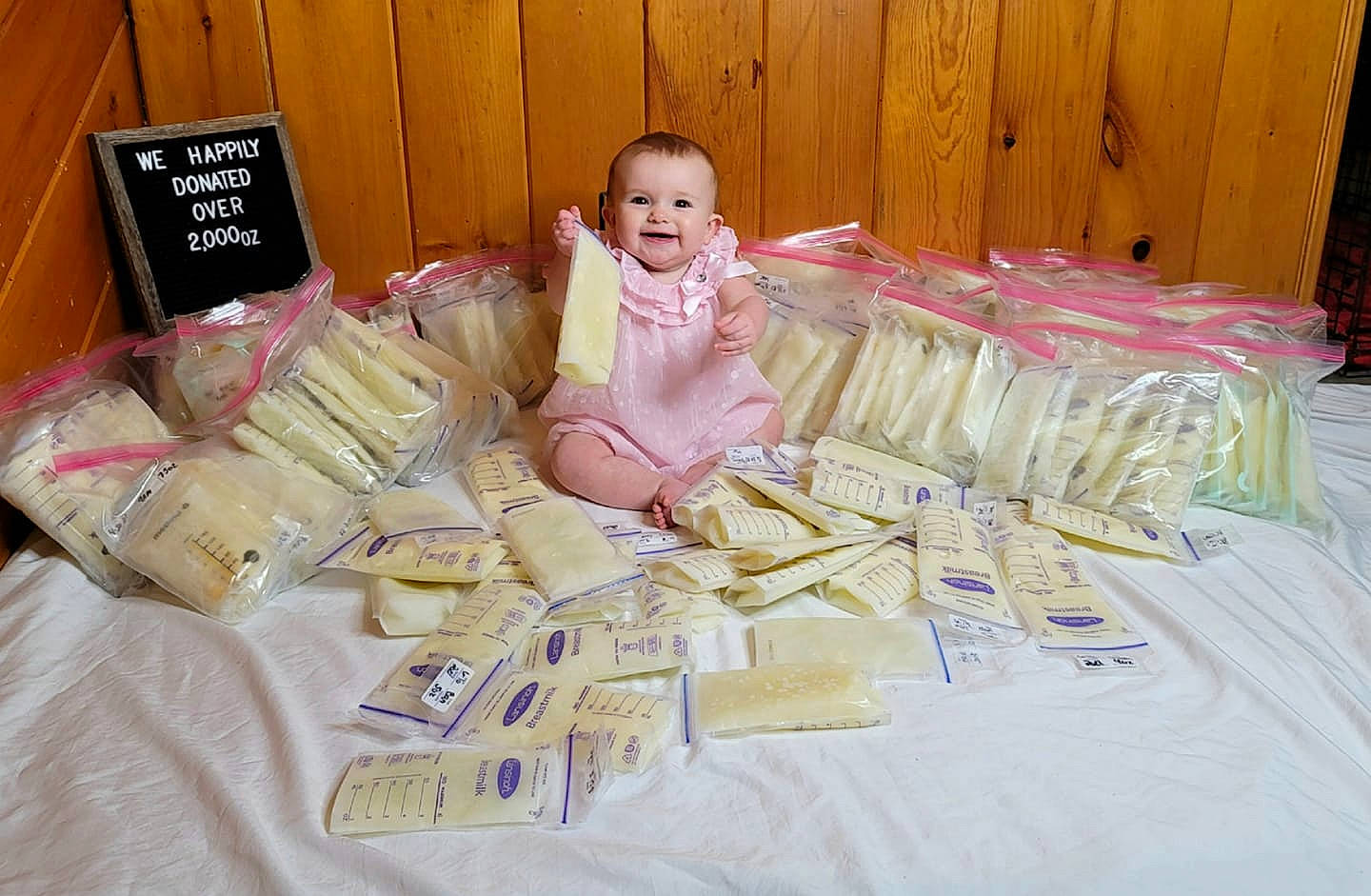 Aelin is registered to the contest to win money with this photo: baby, baby_toddler_clothing, child, dress, event, fun, grass, happy, joy, linens, mammal, paper, paper_product, party, person, play, room, sitting, smile, t_shirt