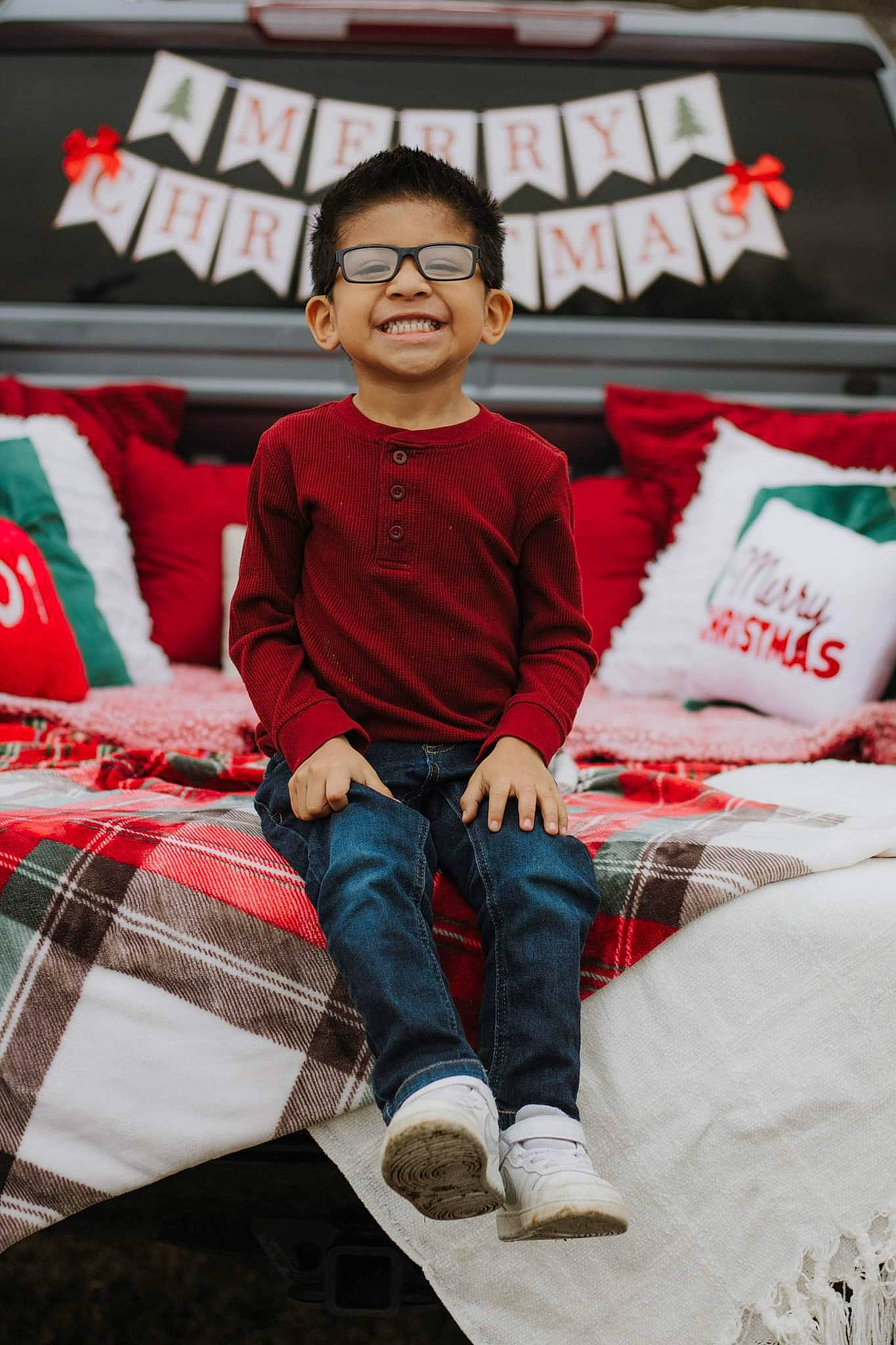 Mateo joined the competition — help win amazing prizes! carmine, child, denim, event, fun, glasses, happy, joy, leisure, linens, pattern, person, plaid, recreation, red, sitting, sleeve, smile, t_shirt, tartan
