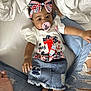 Dutchess joined the competition — help win amazing prizes! baby, blanket, bow, child, clothing, comfortable, cute, denim_skirt, foot, hand, headband, indoor, infant, lying_down, pacifier, person, portrait, ripped_jeans, smiling, white_fabric