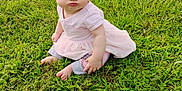 Larisa joined the competition — help win amazing prizes! baby, child, grass, outdoor, cute, pout, pink_dress, curly_hair, greenery, garden, fence, sitting, barefoot, person, infant, funny_face, nature, summer, playtime, portrait
