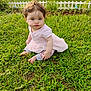 baby, child, grass, outdoor, cute, pout, pink_dress, curly_hair, greenery, garden, fence, sitting, barefoot, person, infant, funny_face, nature, summer, playtime, portrait