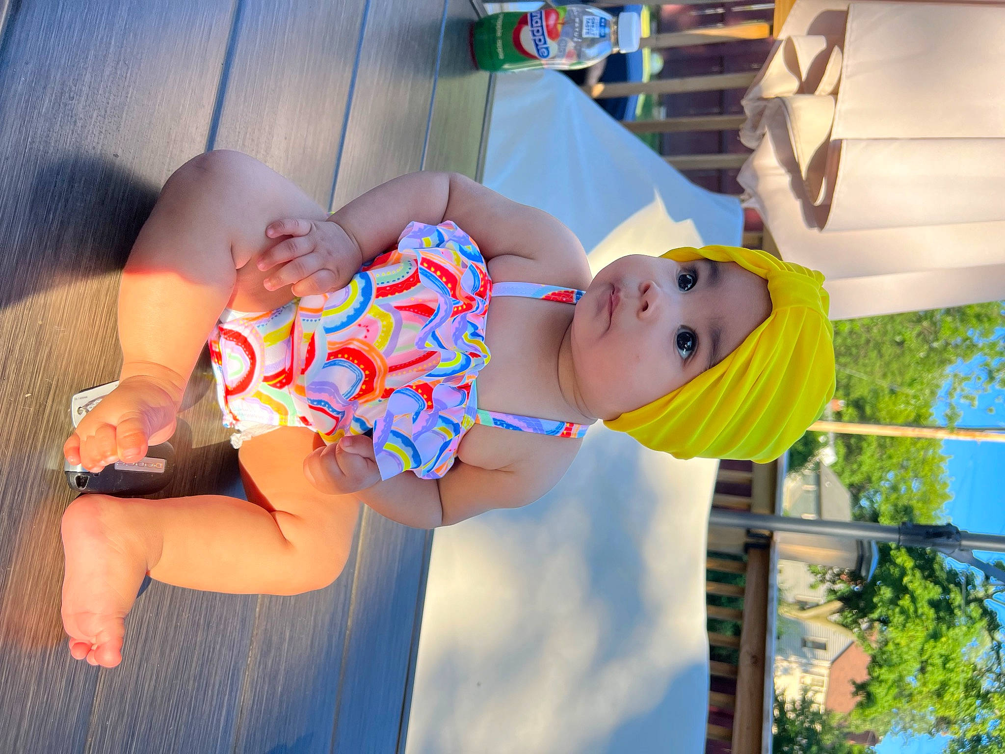 Alaïa joined the competition — help win amazing prizes! abdomen, baby, brassiere, child, elbow, flash_photography, fun, happy, hat, headwear, human_leg, knee, leisure, orange, person, sandal, shorts, thigh, toddler, tree