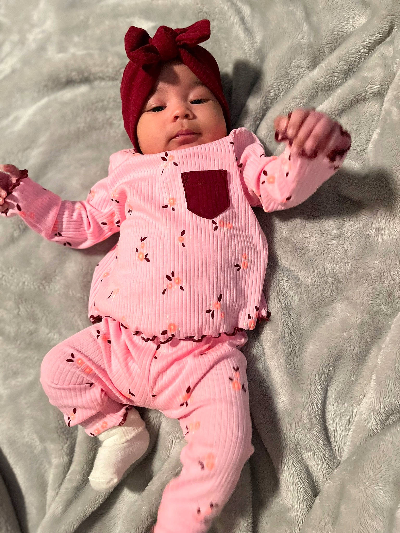 Alaïa joined the competition — help win amazing prizes! arm, baby, baby_toddler_clothing, carmine, child, collar, comfort, facial_expression, gesture, happy, headwear, magenta, outerwear, pattern, person, pink, plant, skin, sleeve, textile