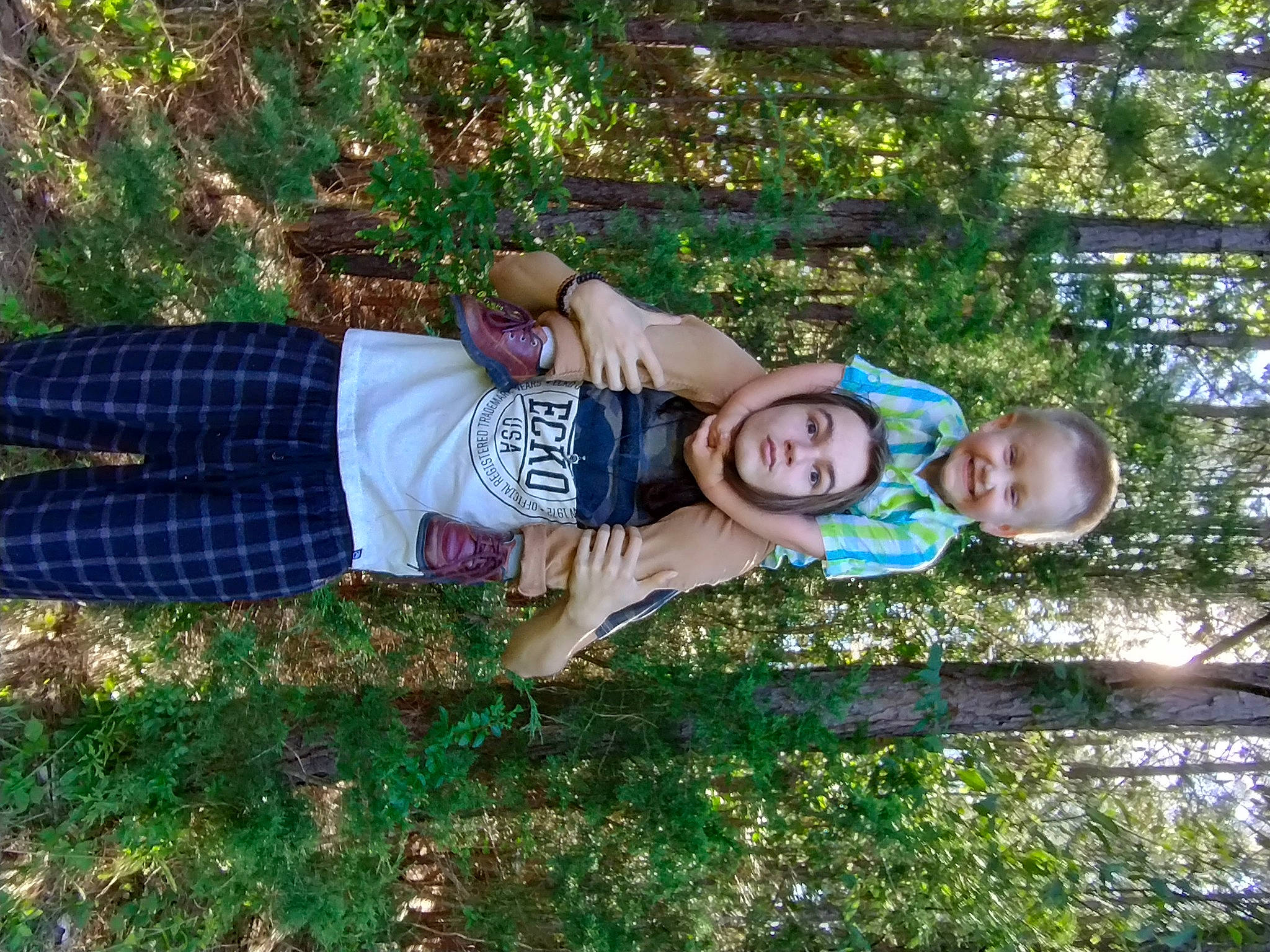 Tyler is registered to the contest to win money with this photo: baby_toddler_clothing, botany, child, electric_blue, face, fun, grass, happy, hat, joy, leaf, leisure, pattern, people_in_nature, person, plant, smile, soil, t_shirt, toddler