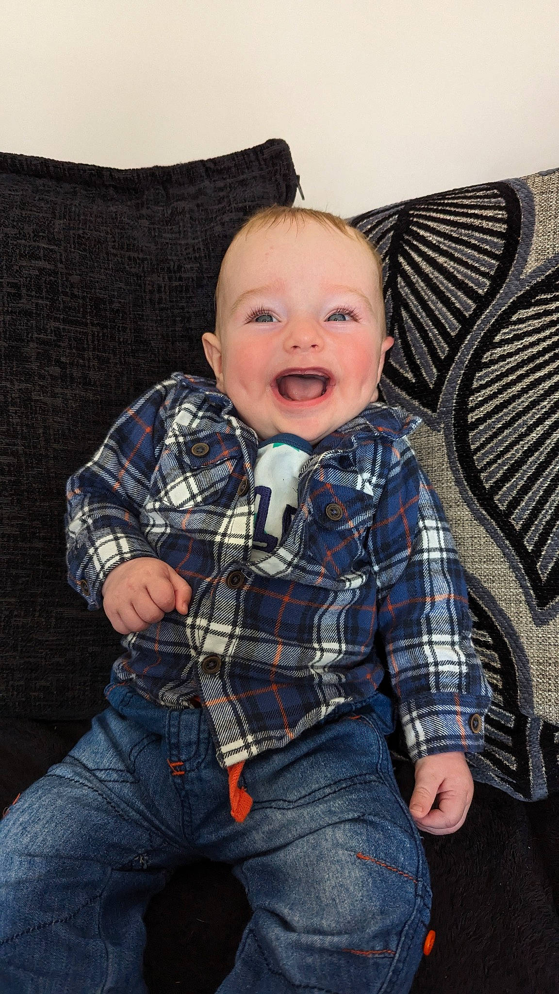 Ethan joined the competition — help win amazing prizes! baby_toddler_clothing, chair, cheek, comfort, cool, couch, dress_shirt, flash_photography, fun, happy, human, iris, jeans, person, plaid, skin, sleeve, smile, tartan, toddler