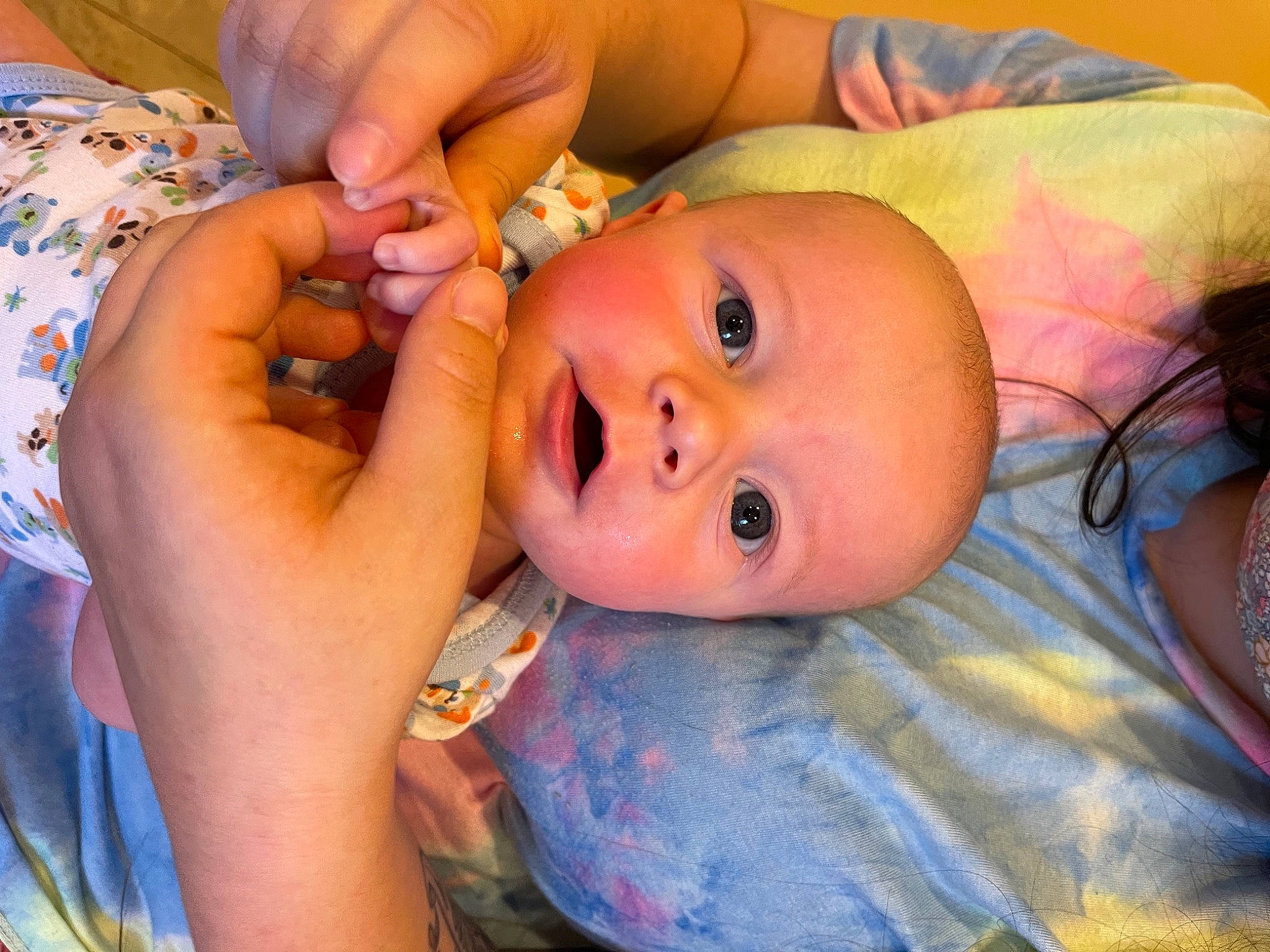 Rhett is registered to the contest to win money with this photo: baby, cheek, ear, eye, eyebrow, eyelash, finger, hand, happy, human_body, iris, lip, mouth, neck, nose, organ, person, skin, smile, thumb