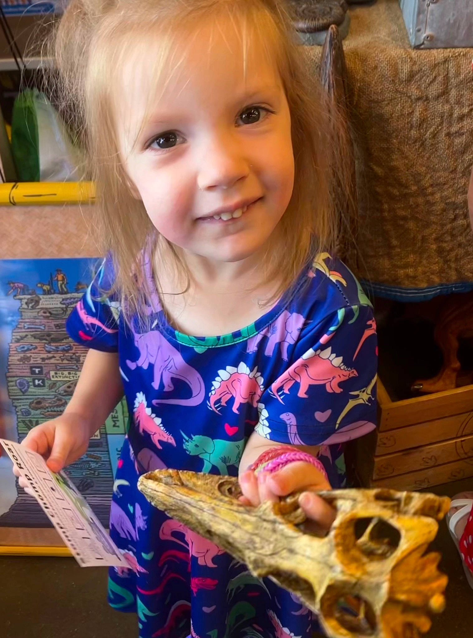 Sterling is registered to the contest to win money with this photo: baby_toddler_clothing, blond, chair, child, comfort_food, event, finger_food, fun, happy, head, iris, joy, junk_food, organ, people, person, play, sitting, smile, t_shirt