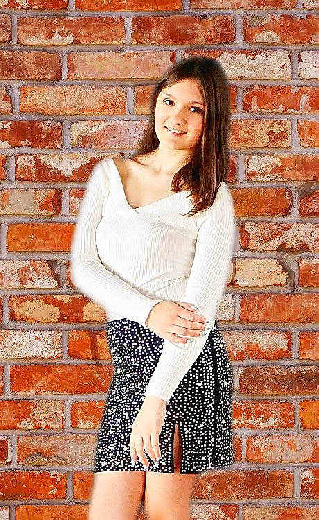 Brylee joined the competition — help win amazing prizes! arm, brick, brickwork, clothing, fashion_design, fashion_model, flash_photography, hair, happy, joint, joy, knee, leg, neck, orange, person, shoulder, sleeve, smile, thigh